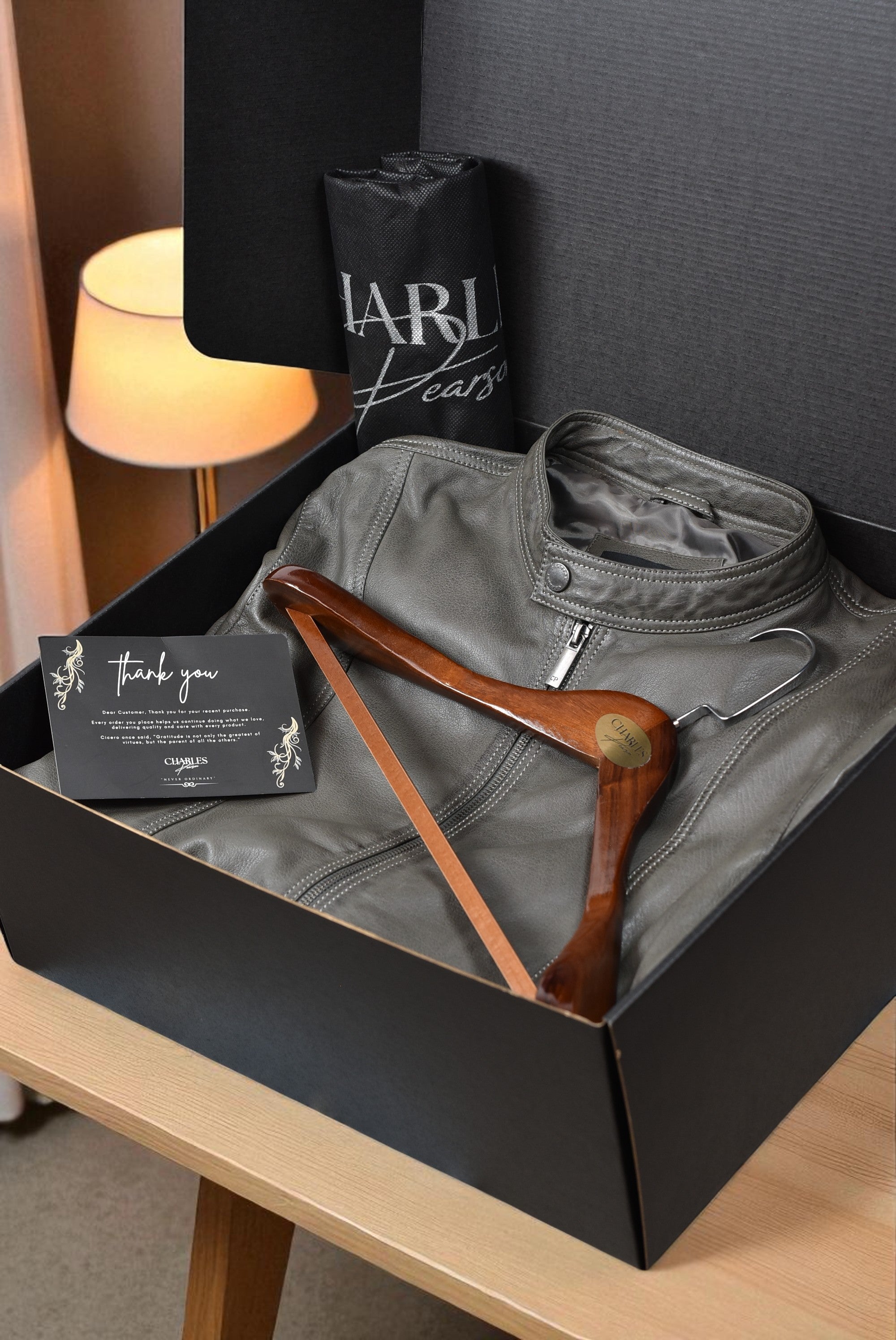Gray leather jacket men with wooden hanger, black box, and card. Summer Gift with box pack for boyfriend